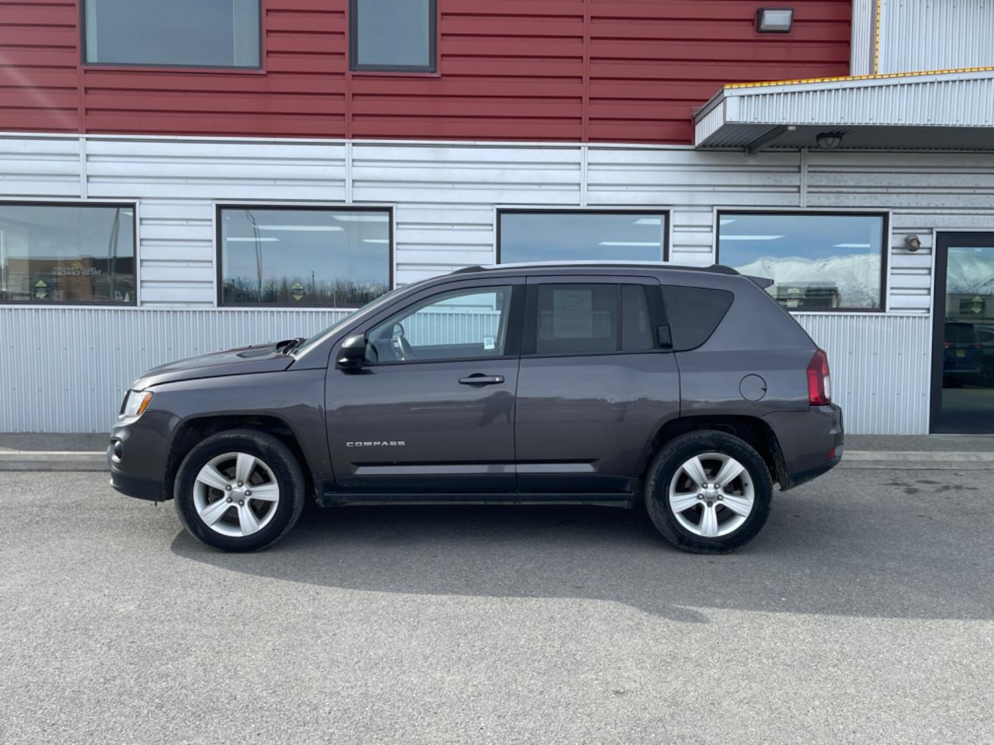 2016 Gray Jeep Compass Sport 4WD (1C4NJDBB2GD) with an 2.4L L4 DOHC 16V engine, auto transmission, located at 1960 Industrial Drive, Wasilla, 99654, (907) 274-2277, 61.573475, -149.400146 - Photo#1